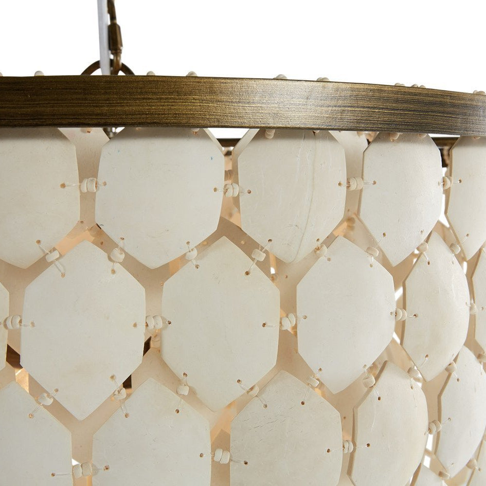 Piatos Hanging Lamp made from natural coconut shell with a brass frame, handcrafted sustainable lighting. Detail.