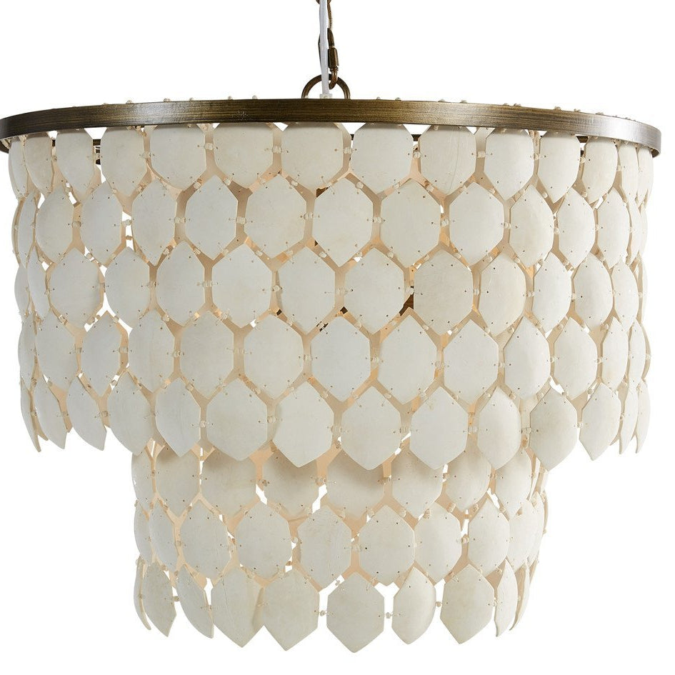 Piatos Hanging Lamp made from natural coconut shell with a brass frame, handcrafted sustainable lighting.