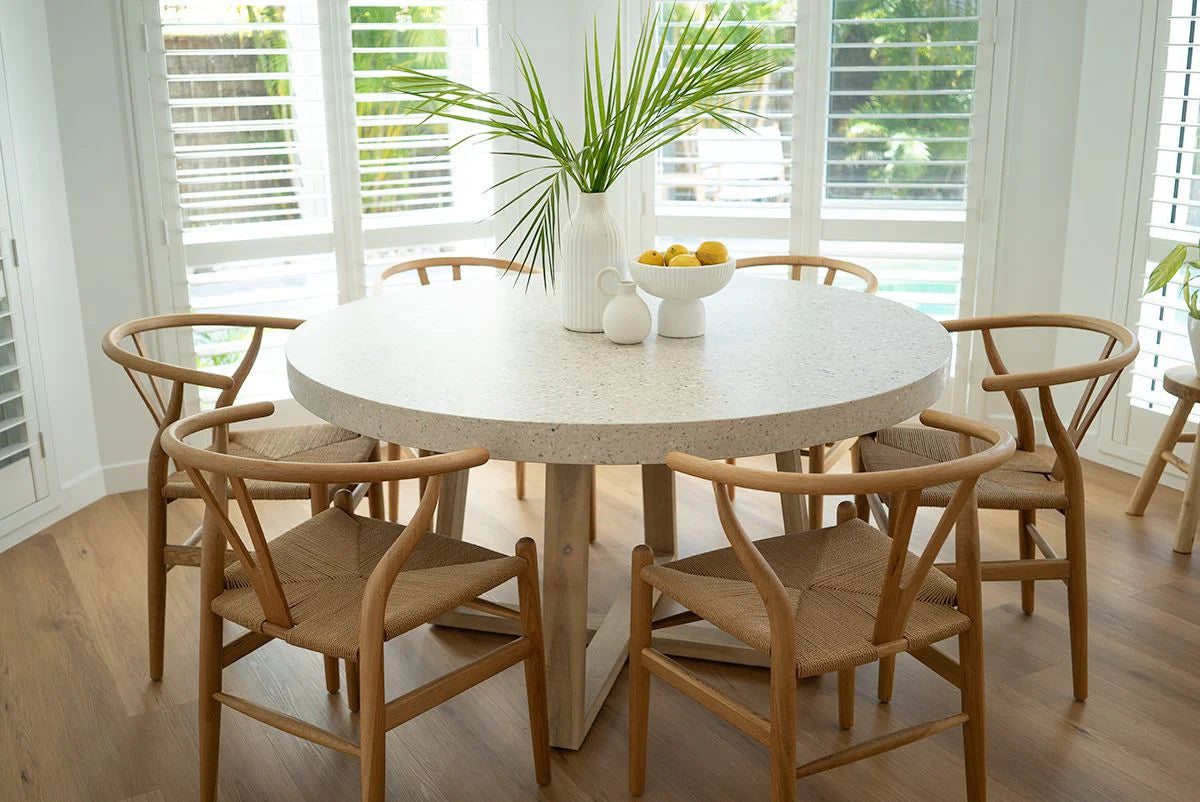Round concrete dining table in ivory, Magnolia Lane coastal dining furniture