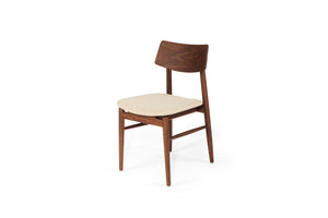 Beautifully crafted dining chair in a solid black American Walnut Frame with comfortable linen coloured seat cushion.  Magnolia Lane modern dining furniture 3
