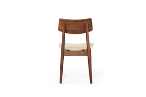 Beautifully crafted dining chair in a solid black American Walnut Frame with comfortable linen coloured seat cushion.  Magnolia Lane modern dining furniture 6