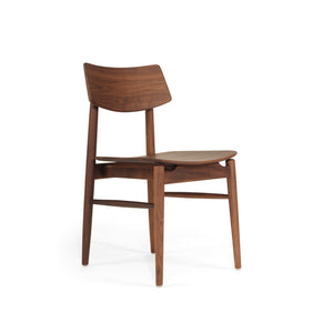Beautifully crafted dining chair in a solid black American Walnut Frame.  Magnolia Lane modern dining furniture