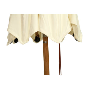 Amalfi Outdoor Parasol with teak pole and marine-grade fittings, round Sunproof Copacobana shade, elegant coastal outdoor umbrella for poolside or garden.  Close up.