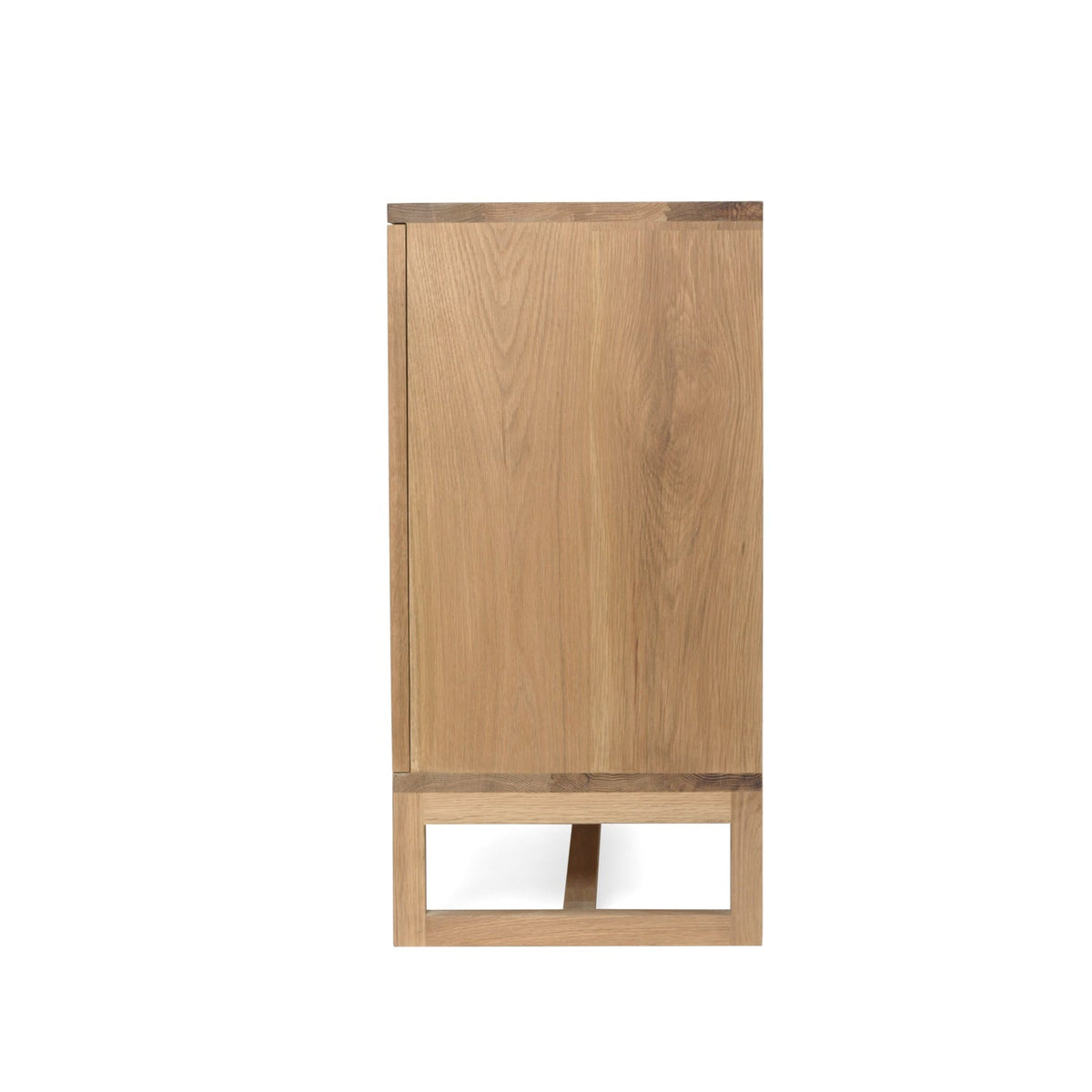 Beach House 300cm natural oak and rattan sideboard, side view showing the oak panel and raised timber base