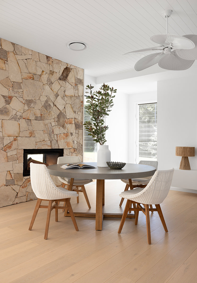 Beach House Outdoor Dining Chairs styled in a relaxed coastal indoor dining room