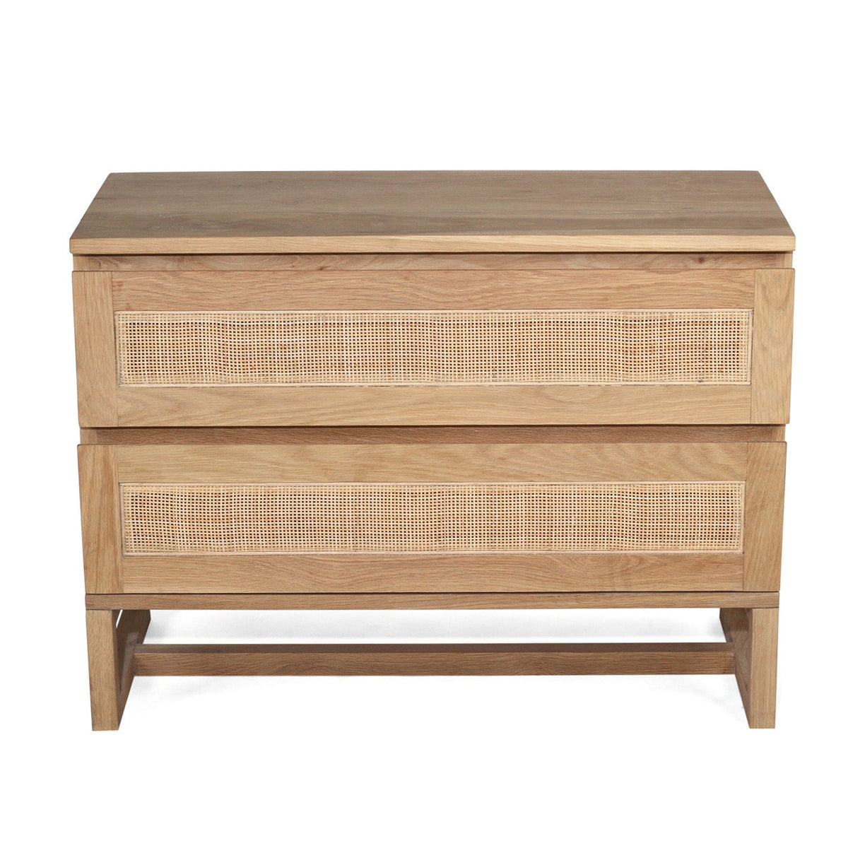 Angled view of the Beach House Wide oak and rattan bedside table