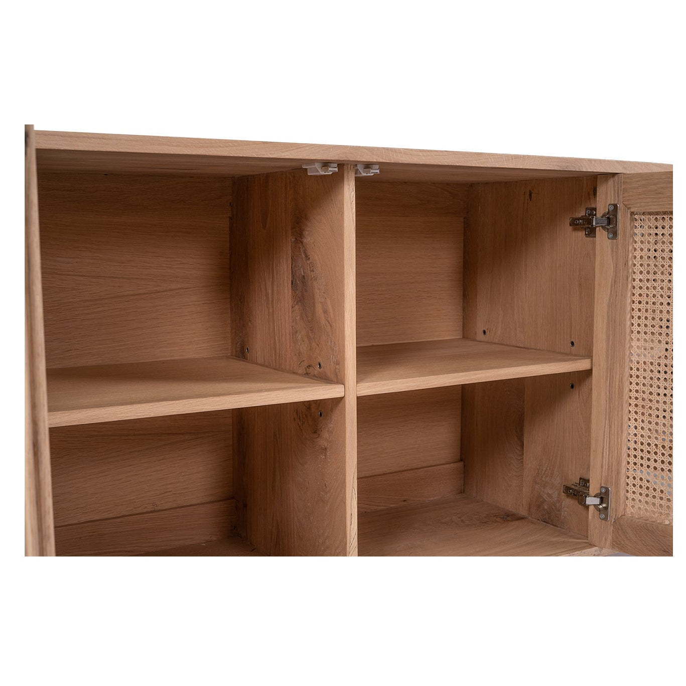 Interior storage of sideboard with fixed shelving and four doors open view