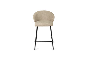 Bellevue Counter Stool with padded Pebble fabric seat and back, slim black powder-coated steel frame, modern elegant design. Front perspective 1.