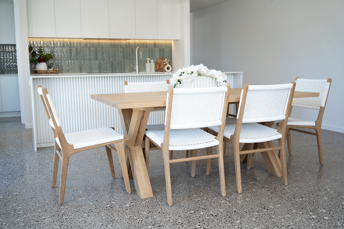 Cable Beach close weave dining chairs styled around an outdoor dining table in a coastal Australian home