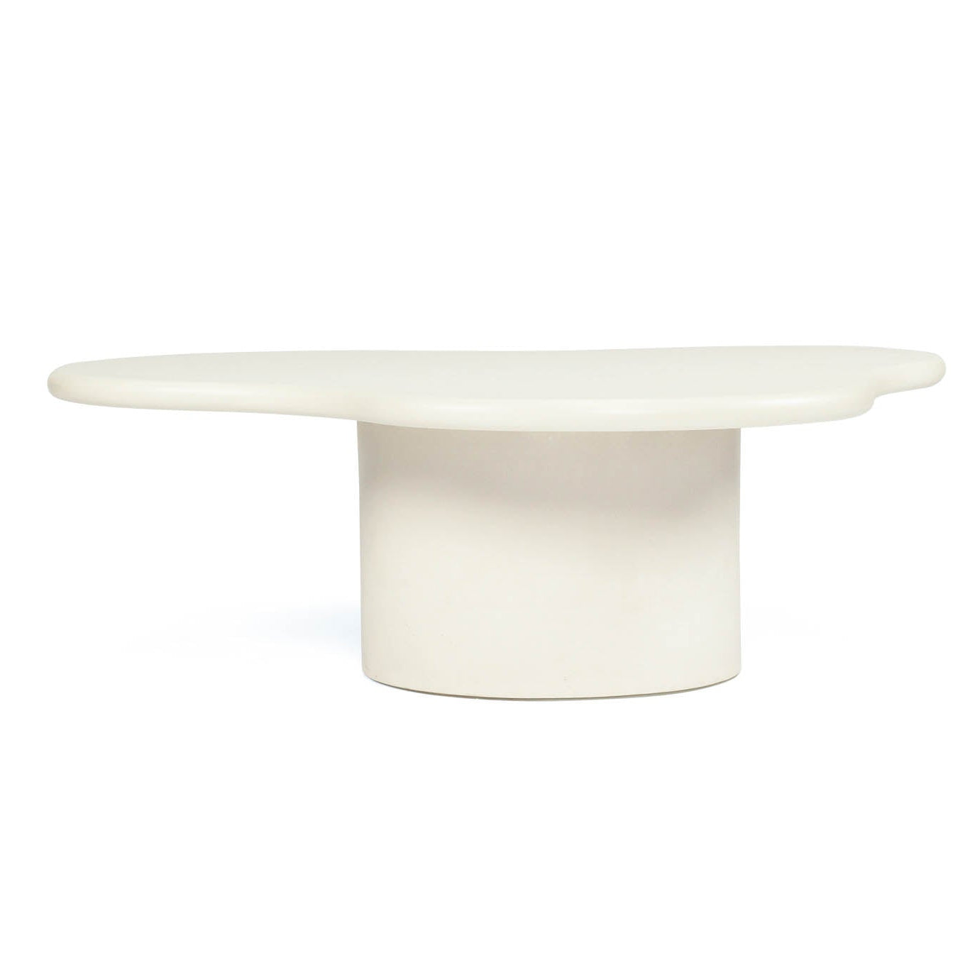 Costa Organic Coffee Table profile view showcasing sculptural form and smooth ivory microcement finish.