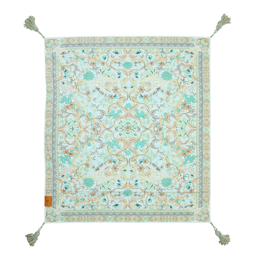 Beautifully designed Wandering Folk Crystal Forest picnic rug in shades of turqoise and blue with a mix of soft colours, Magnolia Lane