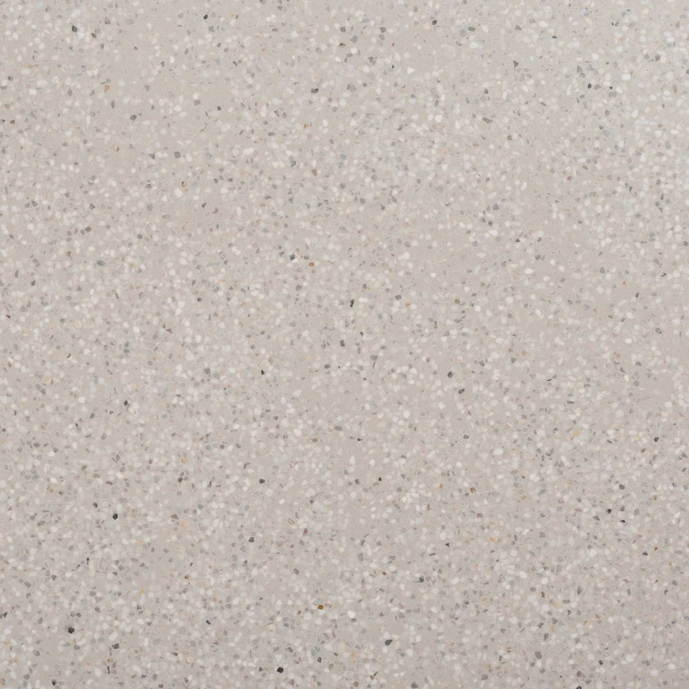 Close-up of Ivory Coast eTerrazzo dining table top showing natural stone texture and variation