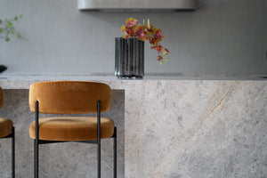 Fontaine Counter Stool with half-moon curved back and metal legs, upholstered in performance velvet in amber, modern Art Deco inspired counter stool for elegant interiors.  Modern kitchen counter stool.
