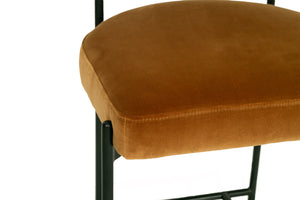 Fontaine Counter Stool with half-moon curved back and metal legs, upholstered in performance velvet in amber, modern Art Deco inspired counter stool for elegant interiors.  Seat close up.