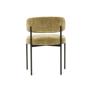 Fontaine Dining Chair with half-moon curved back and metal legs, upholstered in performance ivy velvet, modern Art Deco inspired dining chair for elegant interiors. Back Perspective.