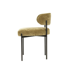 Fontaine Dining Chair with half-moon curved back and metal legs, upholstered in performance ivy velvet, modern Art Deco inspired dining chair for elegant interiors. Side perspective.