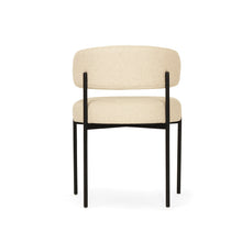 Load image into Gallery viewer, Fontaine Dining Chair with half-moon curved back and metal legs, upholstered in neutral performance linen, modern Art Deco inspired dining chair for elegant interiors.  Back perspective.