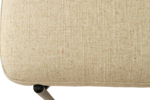 Fontaine Dining Chair with half-moon curved back and metal legs, upholstered in neutral performance linen, modern Art Deco inspired dining chair for elegant interiors.  Close up 2.