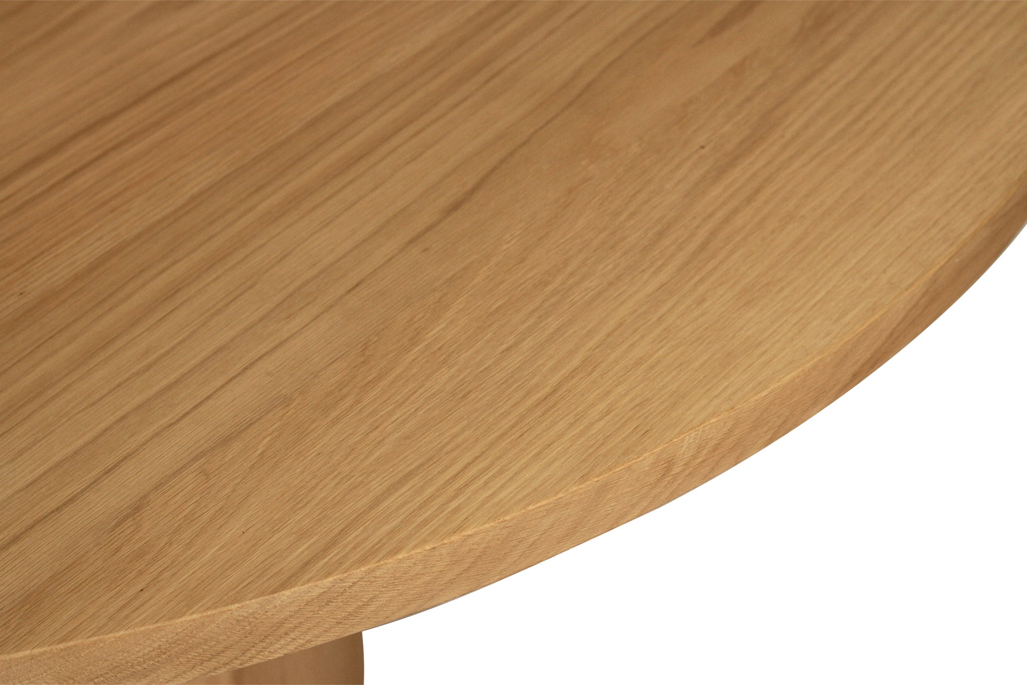 Fontaine Dining Table in solid American Oak with oak veneer base, handcrafted with fine sanded raw finish, modern coastal dining furniture for timeless interiors.  Close up table top 1.