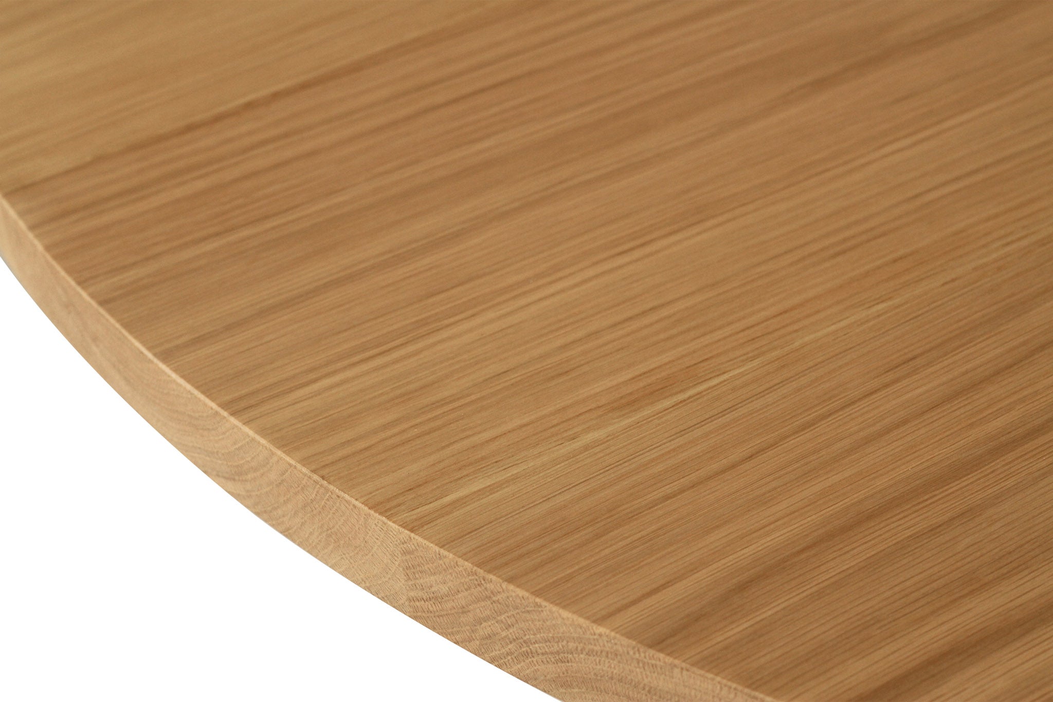 Fontaine Dining Table in solid American Oak with oak veneer base, handcrafted with fine sanded raw finish, modern coastal dining furniture for timeless interiors.  Close up table top.