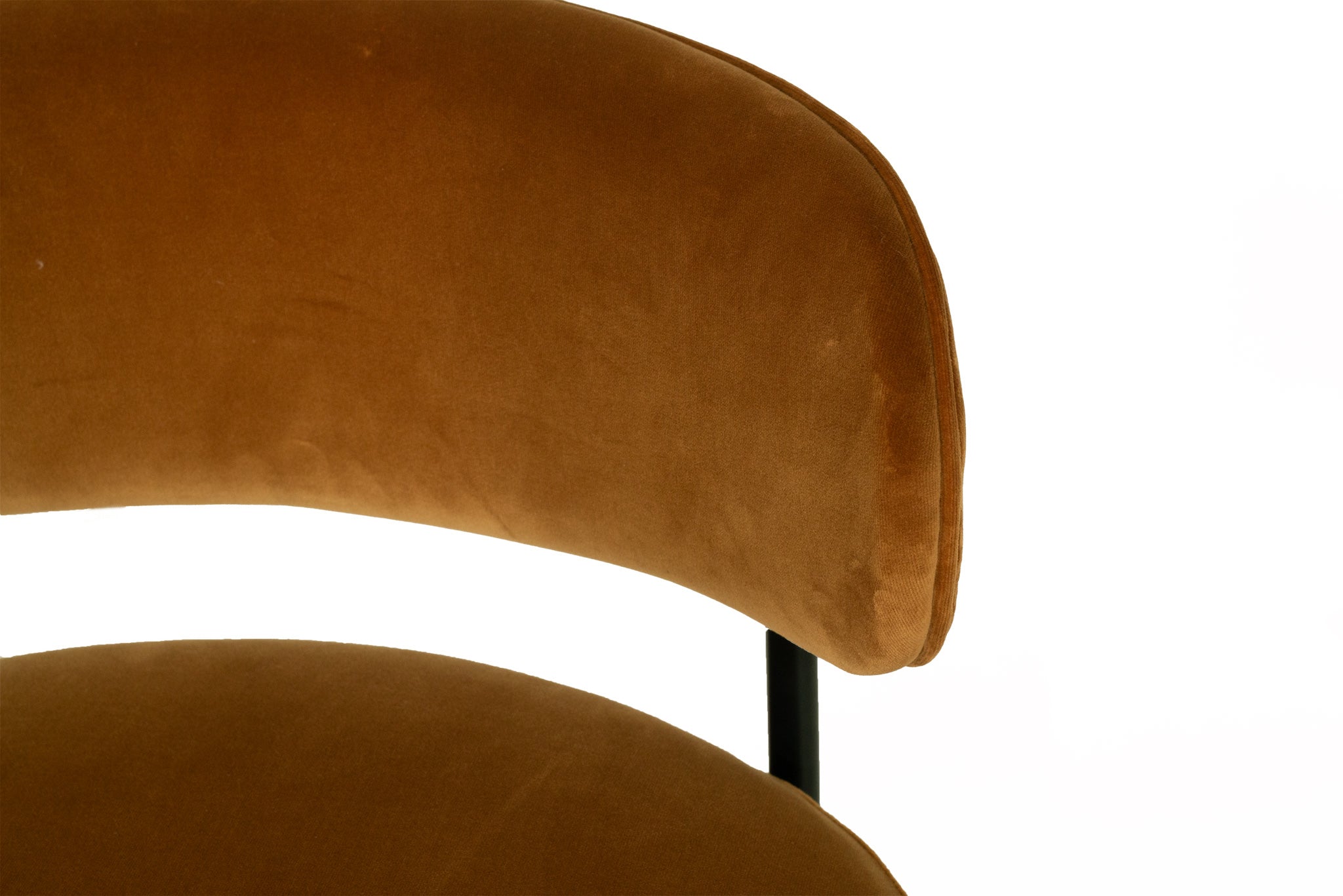 Fontaine Dining Chair with half-moon curved back and metal legs, upholstered in performance amber velvet, modern Art Deco inspired dining chair for elegant interiors. Close up backrest.