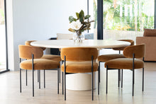 Load image into Gallery viewer, Fontaine Dining Chair with half-moon curved back and metal legs, upholstered in performance amber velvet, modern Art Deco inspired dining chair for elegant interiors. Modern dining suite.