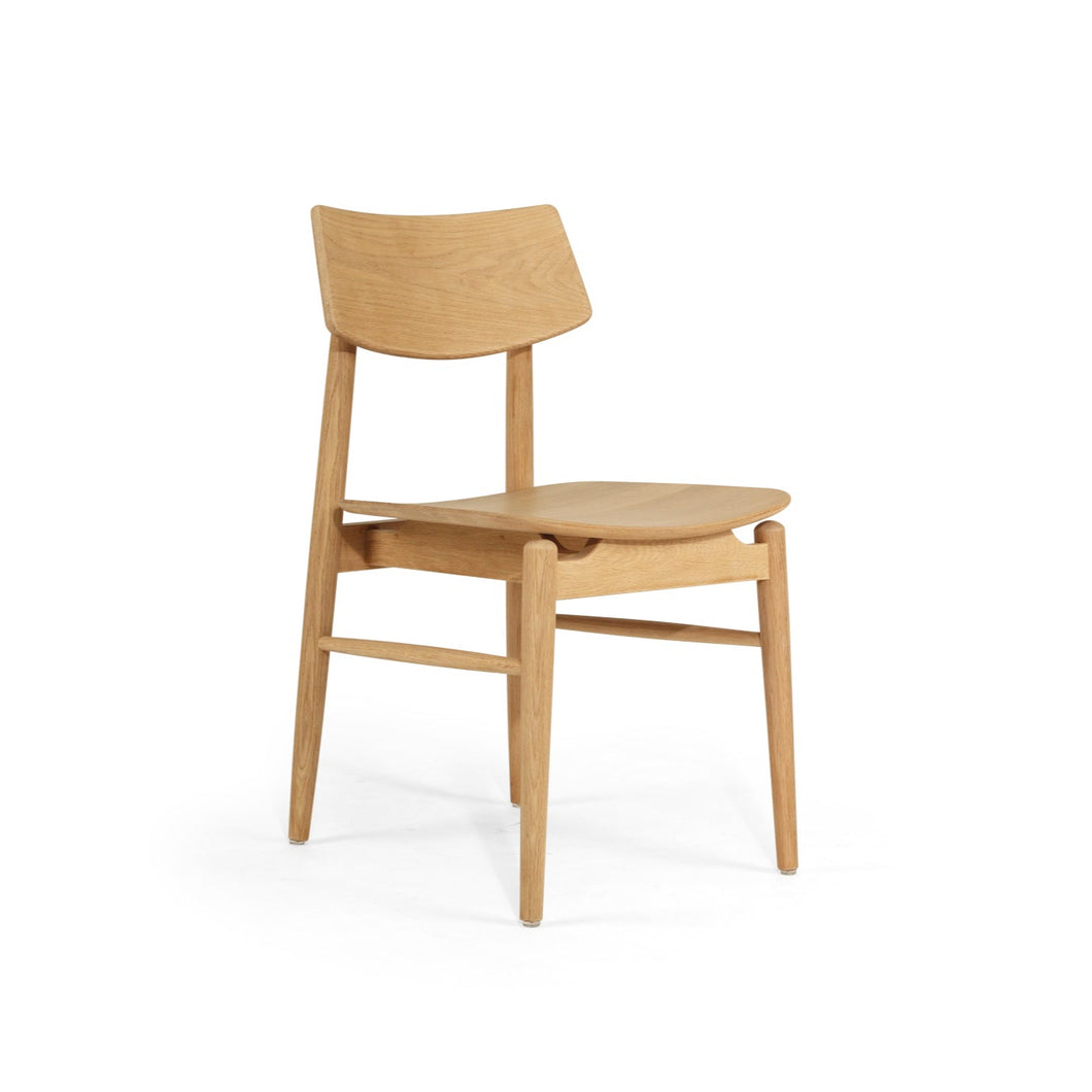 Beautifully crafted dining chair in a solid American Oak Frame in a natural finish.  Magnolia Lane modern dining furniture
