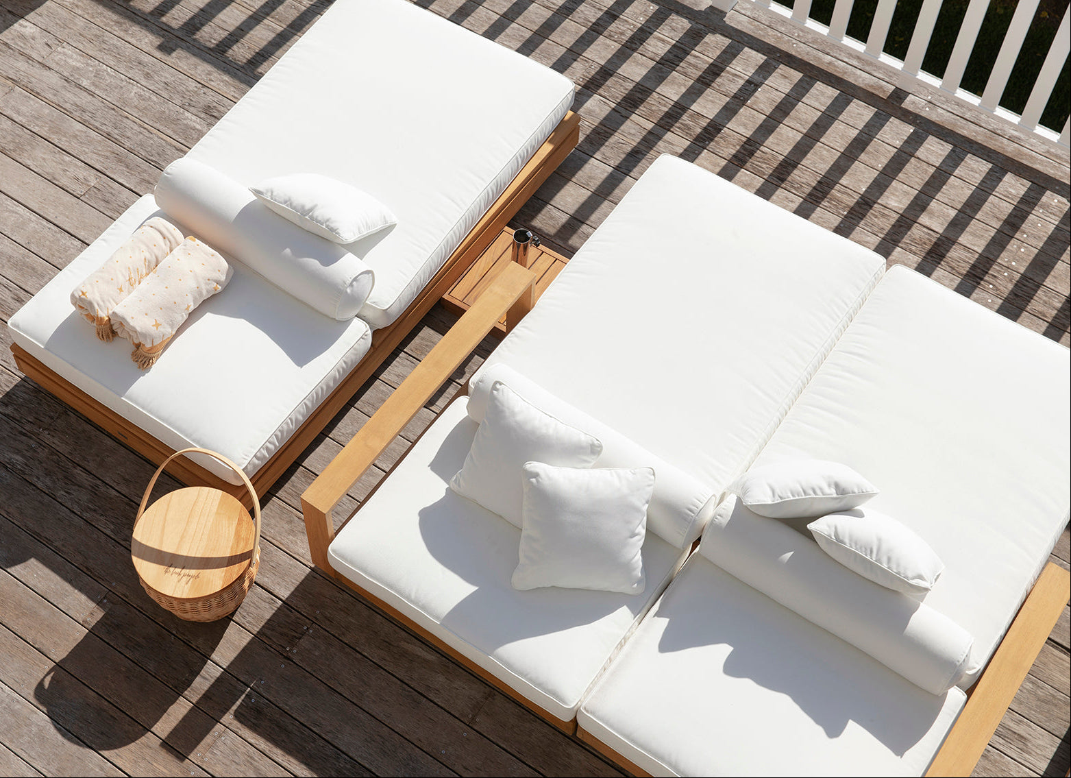 Detail view of the Harbour Island Double Outdoor Sun Lounger with Arms showing the premium teak frame and outdoor cushions.