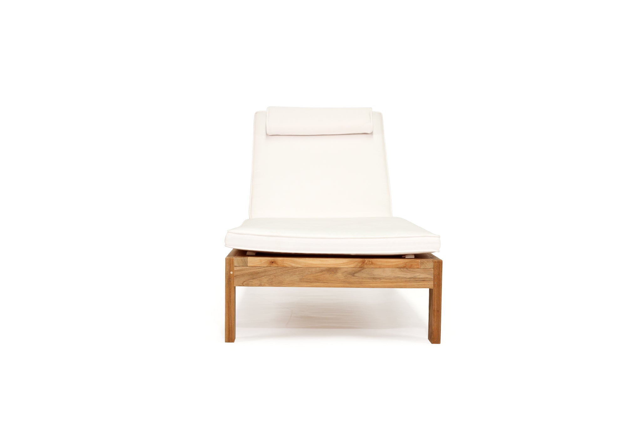 Harbour Island Slim Outdoor Sunlounger in Grade A teak with white Sunbrella cushion, adjustable backrest and wheels, coastal outdoor furniture for poolside or garden relaxation. Front perspective.