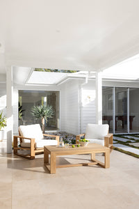 Harbour Island Outdoor Coffee Table – High, made from sustainable premium-grade teak, showcasing a robust, minimalist design ideal for indoor or outdoor use with lasting durability.  Styled beautifully in this coastal home.