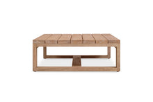 Load image into Gallery viewer, Harbour Island Outdoor Coffee Table – oversize low, made from sustainable premium-grade teak, showcasing a robust, minimalist design ideal for indoor or outdoor use with lasting durability. Side view.