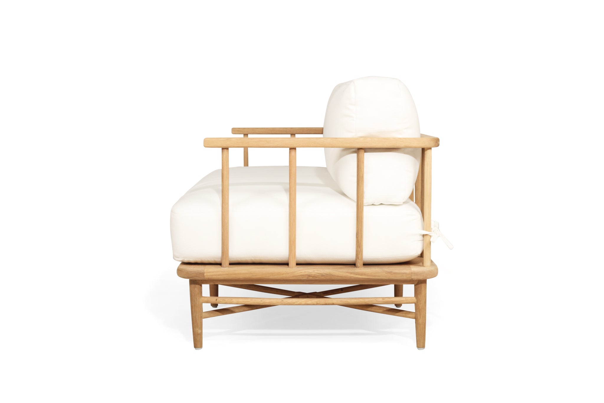 The Harbour Island Two Seater Sofa with light timber frame and white cushions – coastal luxe design perfect for relaxed interiors - side view