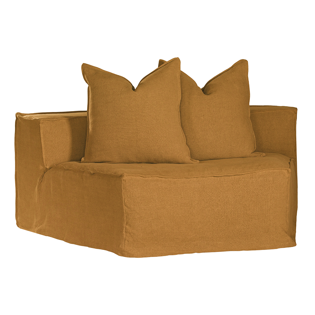 Hendrix Modular Sofa Curve Module in Ochre, front three-quarter view with two scatter cushions