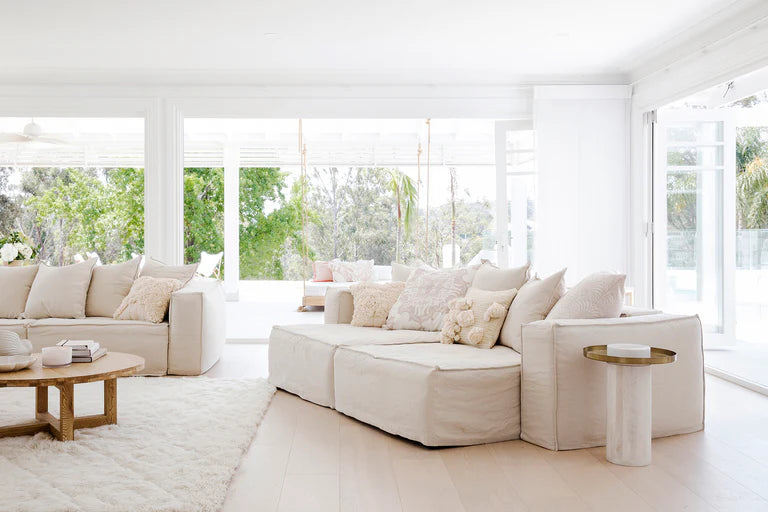 Uniqwa Hendrix Modular Sofa with corner section, with feather cushioning and removable slipcover, timber frame modern coastal sofa with scatter cushions, available in multiple colours.  As seen in Three Birds Renovations 1.