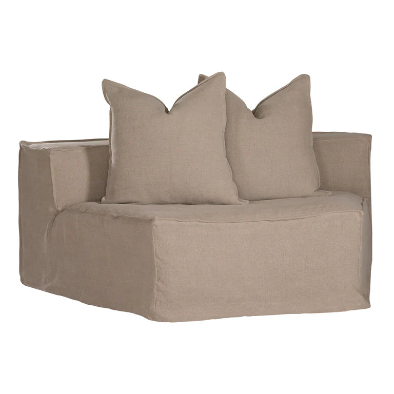 Uniqwa Hendrix Modular Sofa with curve section, with feather cushioning and removable slipcover, timber frame modern coastal sofa with scatter cushions, available in multiple colours. Front of curve section.