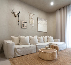 Uniqwa Hendrix modular Sofa with feather cushioning and removable slipcover, timber frame modern coastal sofa with scatter cushions, available in multiple colours. Styled in this modern coastal interior.