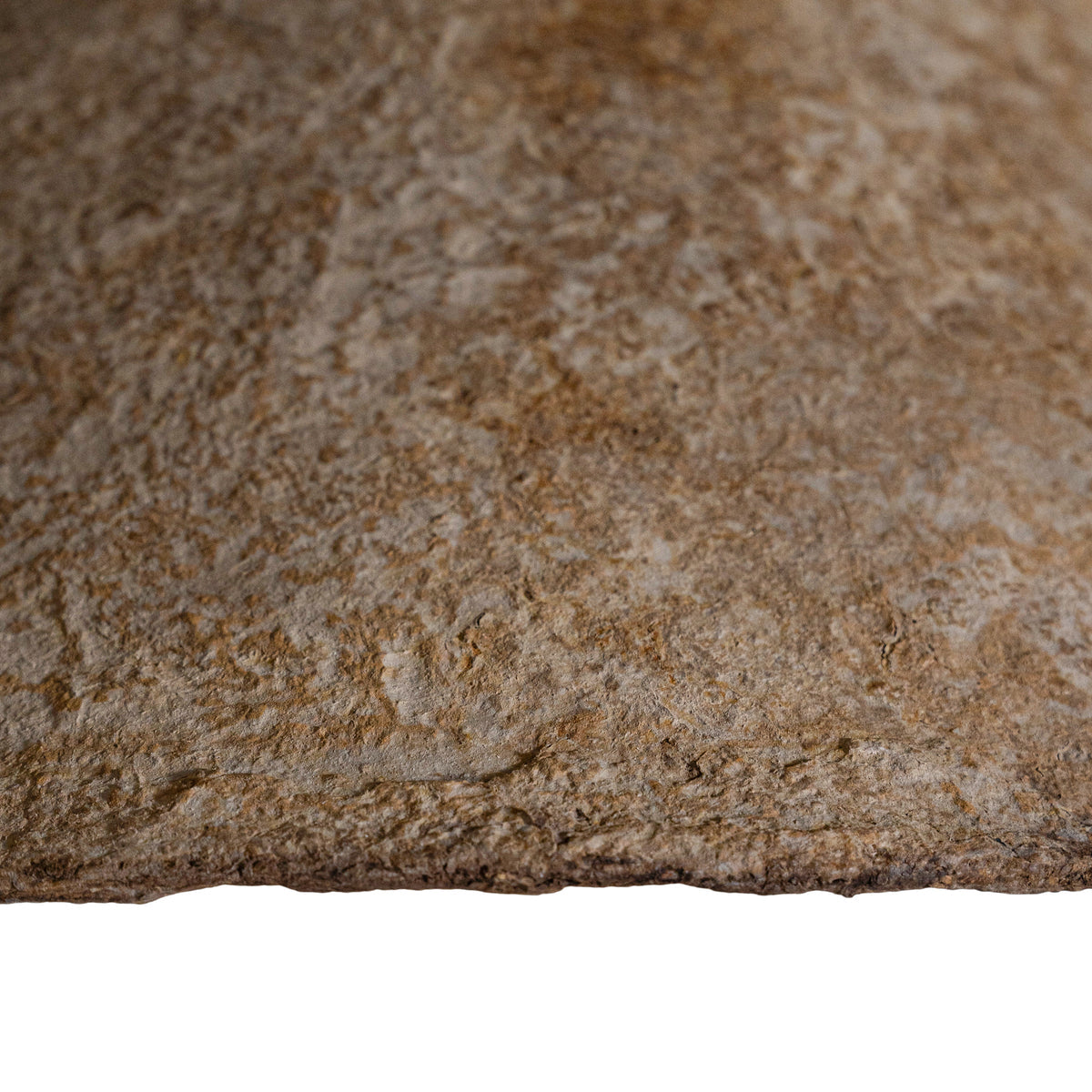 Detailed view of the Khufu Pendant's Dark Roast finish, featuring rich earth-toned colouring, hand-applied texture and unique surface movement 2.