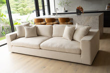 Load image into Gallery viewer, Lucca Four Seater Sofa in performance linen blend upholstery in Dune, refined design, available in boucle oatmeal or saddle leather. Styled beautifully in this luxury modern interior.