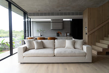 Load image into Gallery viewer, Lucca Four Seater Sofa in performance linen blend upholstery in Dune, refined design, available in boucle oatmeal or saddle leather.  Styled beautifully in this modern home.