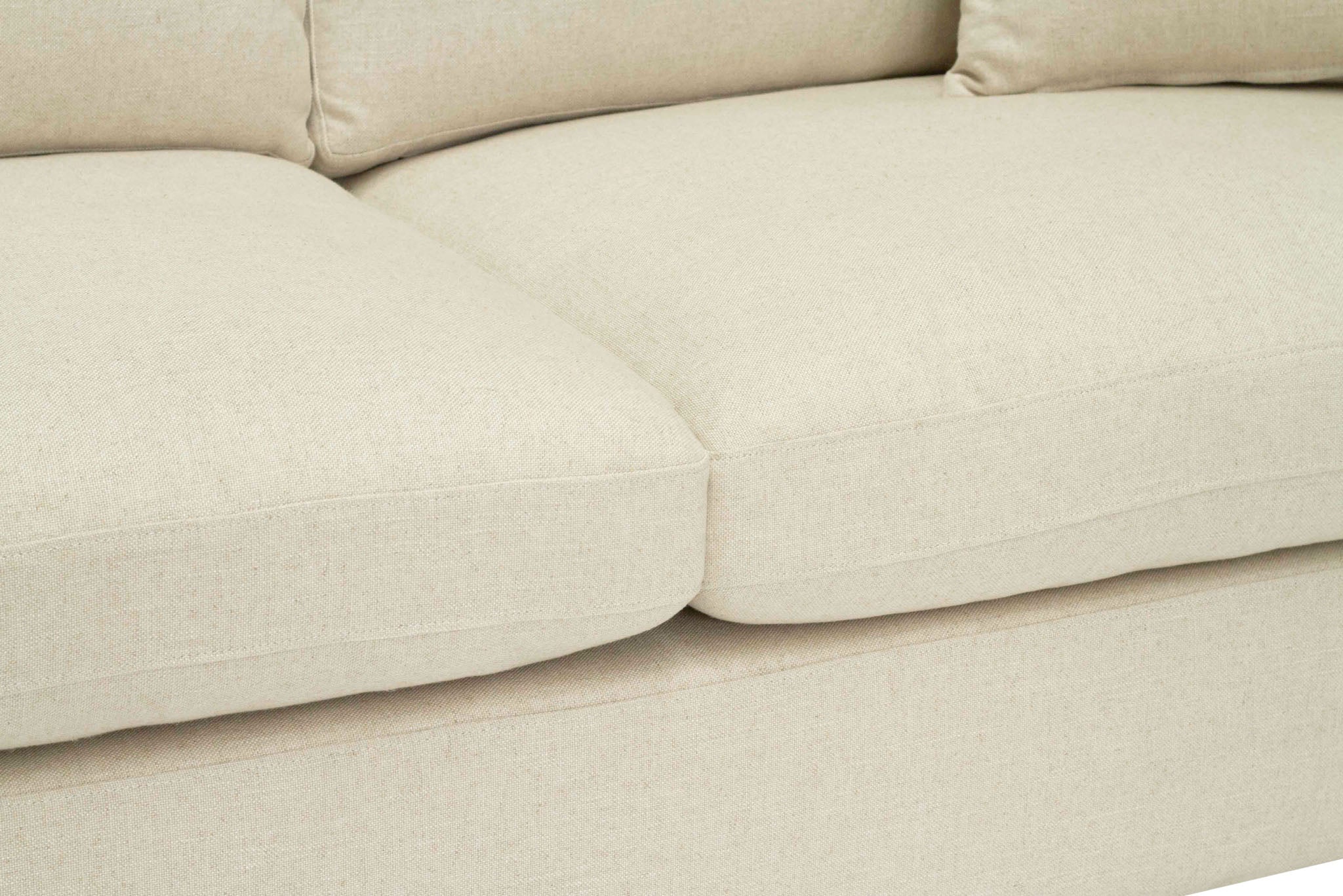 Lucca Four Seater Sofa in performance linen blend upholstery in Dune, refined design, available in boucle oatmeal or saddle leather.  Seat cushions.