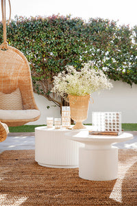 Makenge Rattan Hanging Chair by Uniqwa sold by Magnolia Lane for modern coastal outdoor living 1