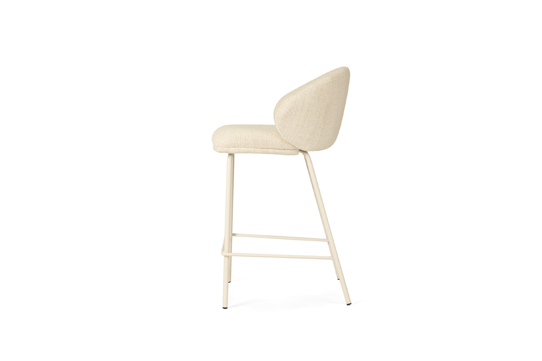 Bellevue Counter Stool with padded Natural fabric seat and back, slim white powder-coated steel frame, modern elegant design. Side perspective.