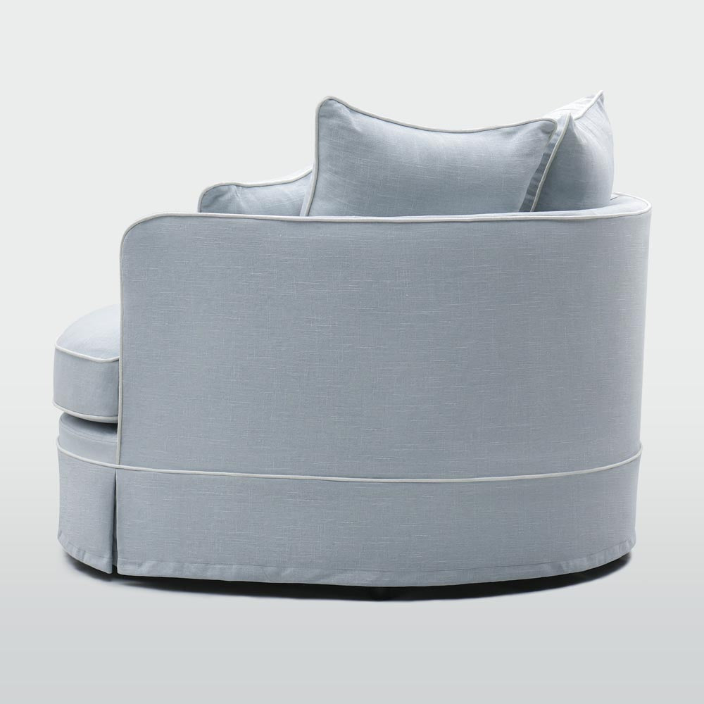 Noosa snuggle occasional chair in Beach with White Piping, rear view