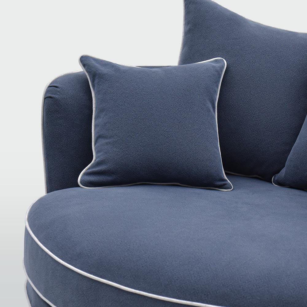 Noosa snuggle occasional chair in Navy with White Piping, cushion detail
