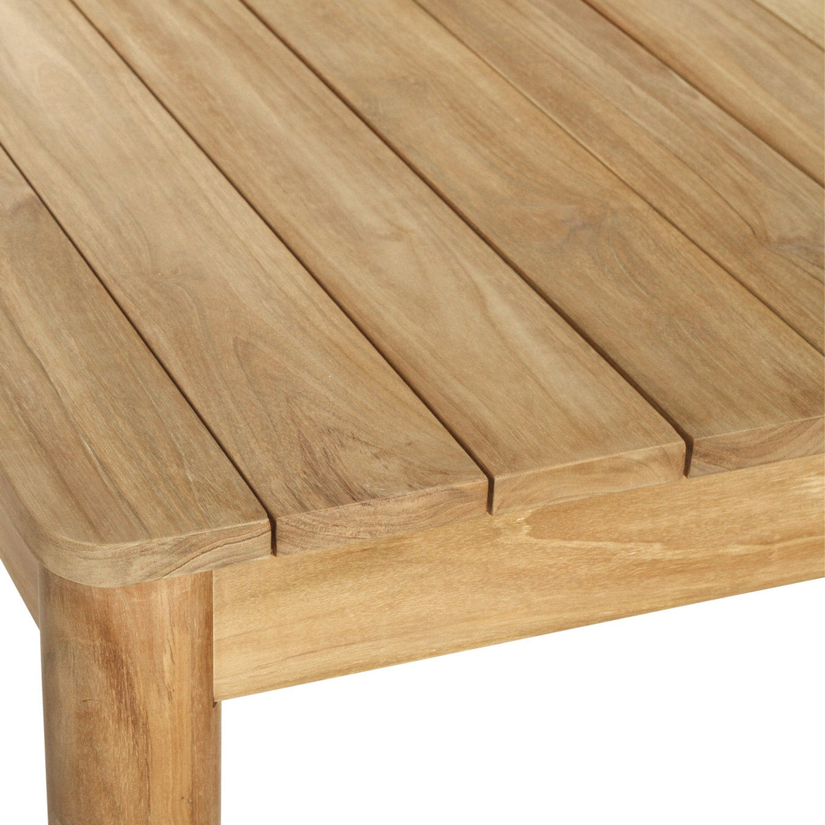 Noosa outdoor dining table showing natural teak grain and slatted tabletop detail