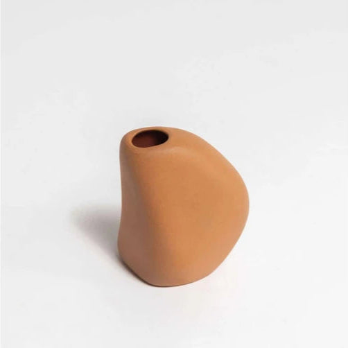 Pebble bud vase inspired by Vietnamese artisans, featuring organic seed-like shapes in a modern colour palette. Perfect styled alone or clustered with other vases for character and charm. Magnolia Lane