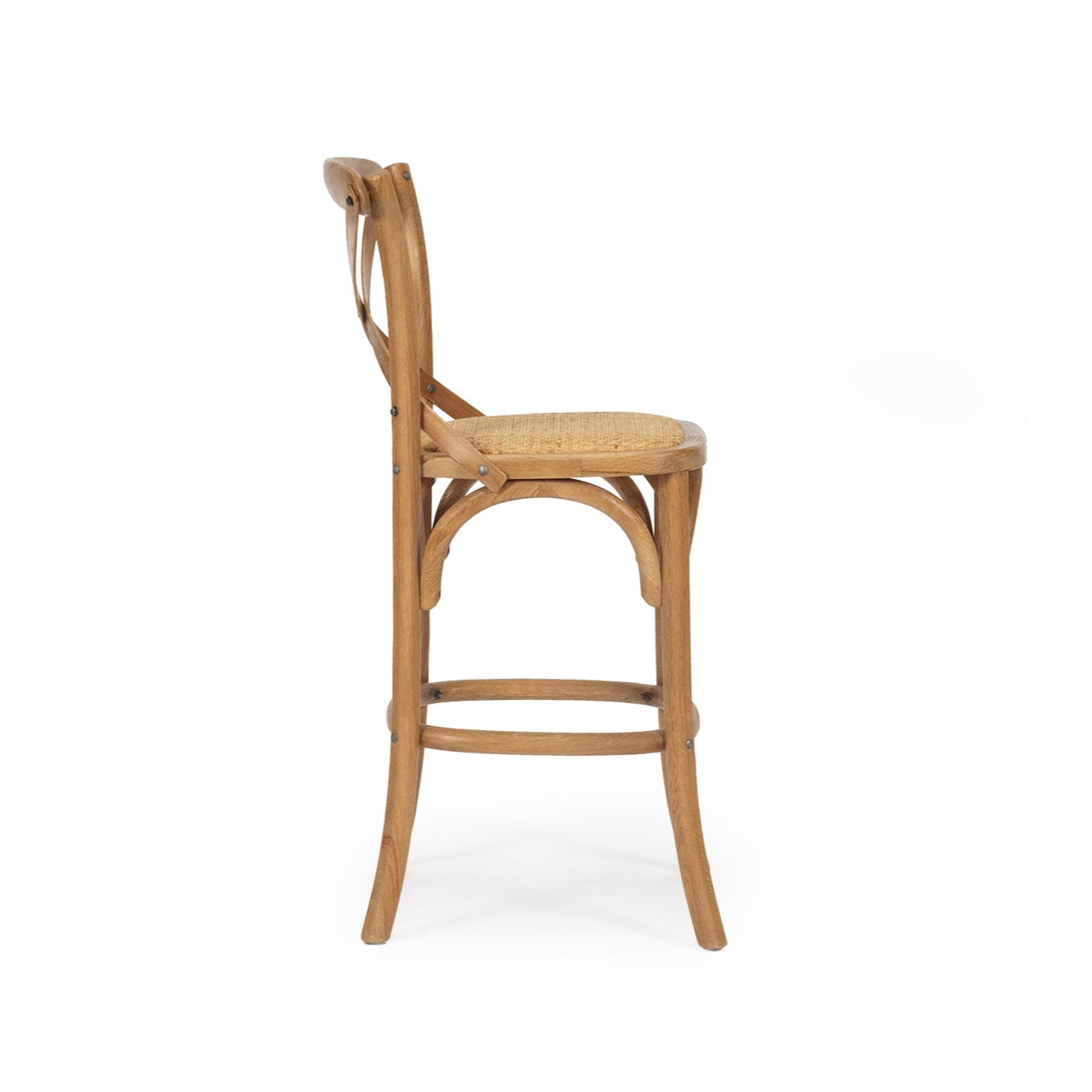 Settler Provincial Cross Back Counter Stool in oak with rattan seat, French café style stool for coastal and provincial interiors.  Side perspective.