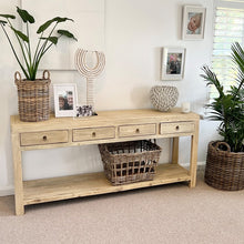 Load image into Gallery viewer, Reclaimed timber console table with four drawers and brass-look metal handles, handcrafted coastal furniture combining rustic and contemporary design for a warm, natural interior. Styled in a Modern coastal interior.