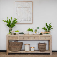 Load image into Gallery viewer, Reclaimed timber console table with four drawers and brass-look metal handles, handcrafted coastal furniture combining rustic and contemporary design for a warm, natural interior.  Sytled beautifully in this modern coastal interior.