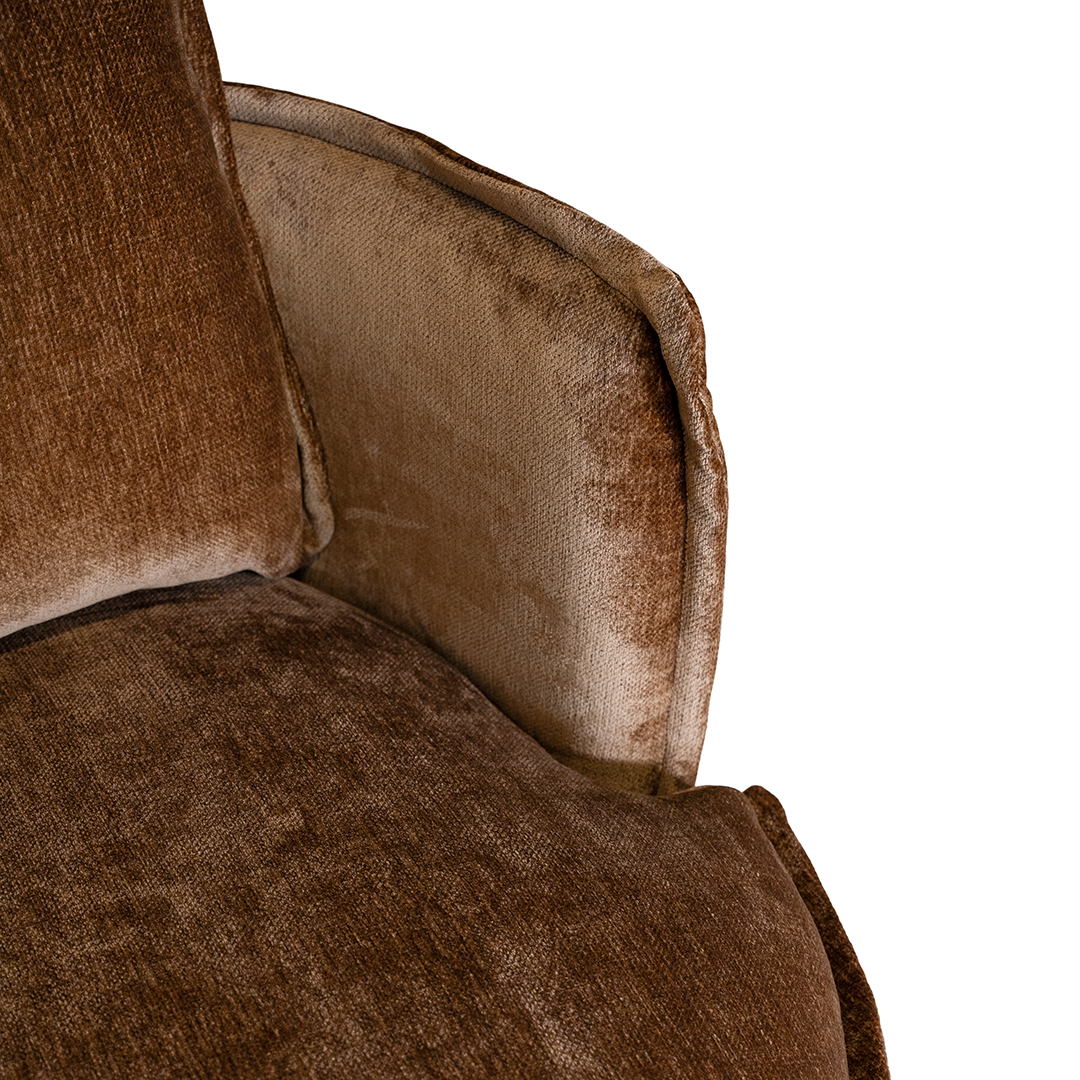 Close-up of the refined bronze fabric upholstery and cushion detailing on the Sabora Swivel Chair. Seat detail.